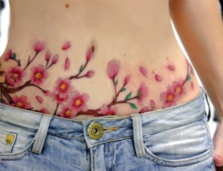 Whimsical Blossom Tummy Tuck Tattoo