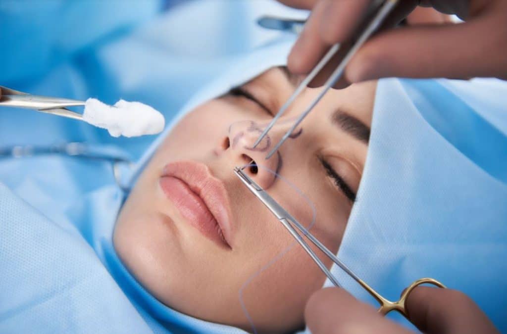 A woman getting a closed rhinoplasty